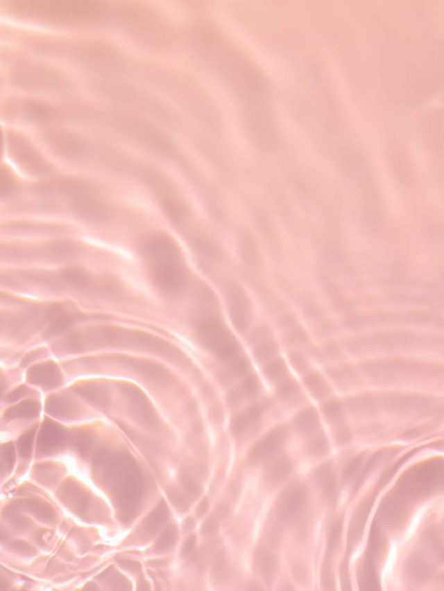 De-focused.,Closeup,Of,Pink,Transparent,Clear,Calm,Water,Surface,Texture